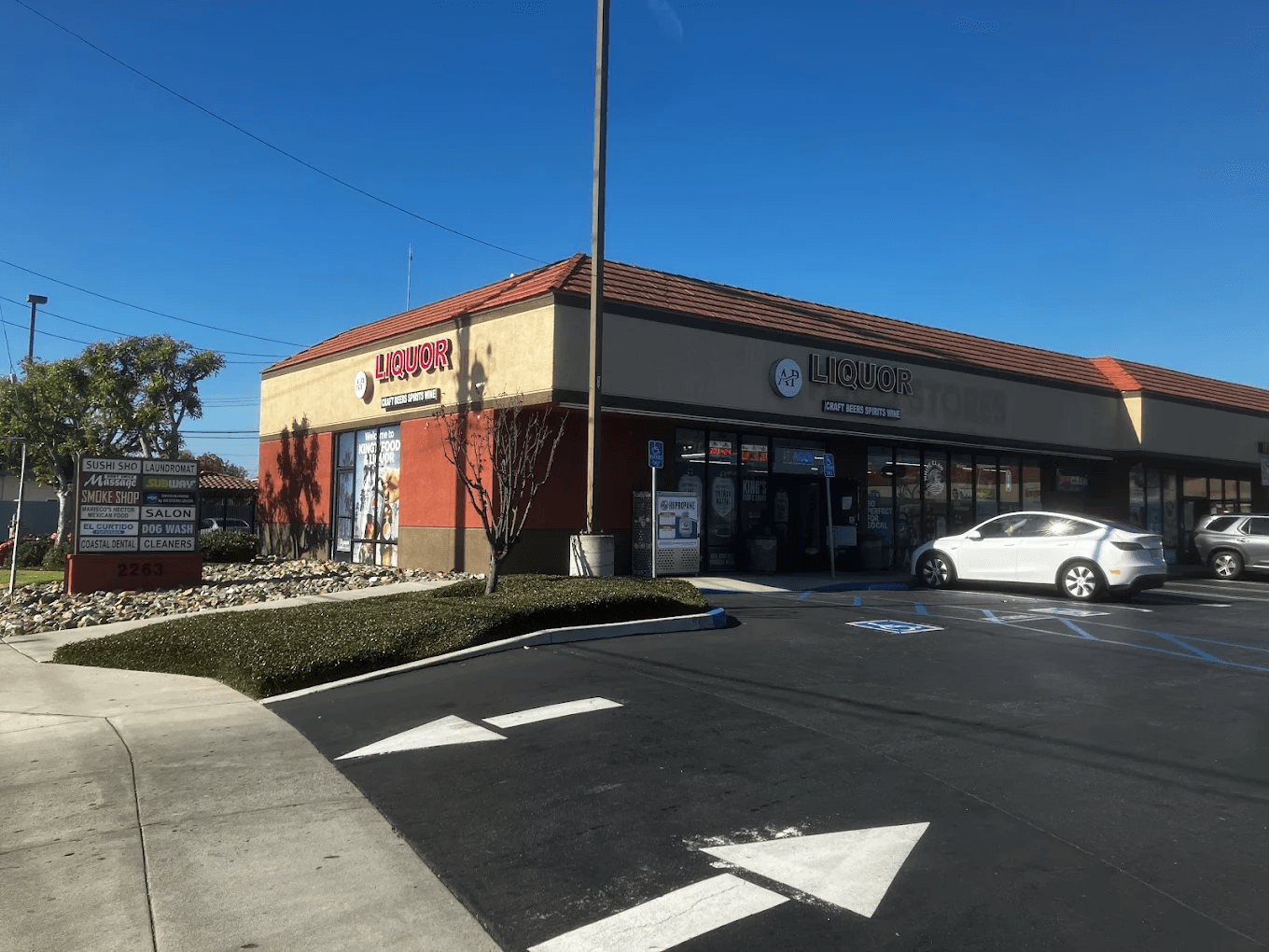 AP Liquor storefront and parking on Fairview Road in Costa Mesa